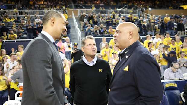 Juwan howard jim harbaugh warde manuel